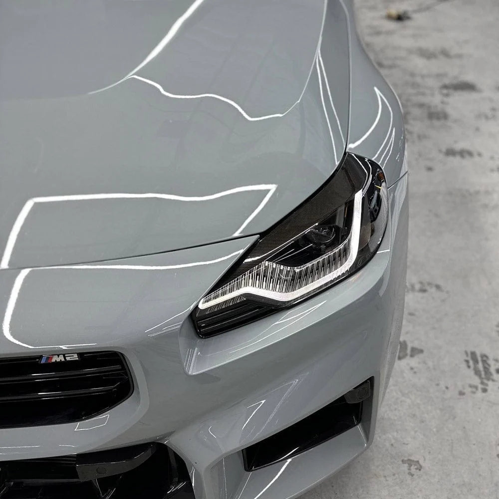 G87 Carbon Fiber Headlight Eyebrow Trim